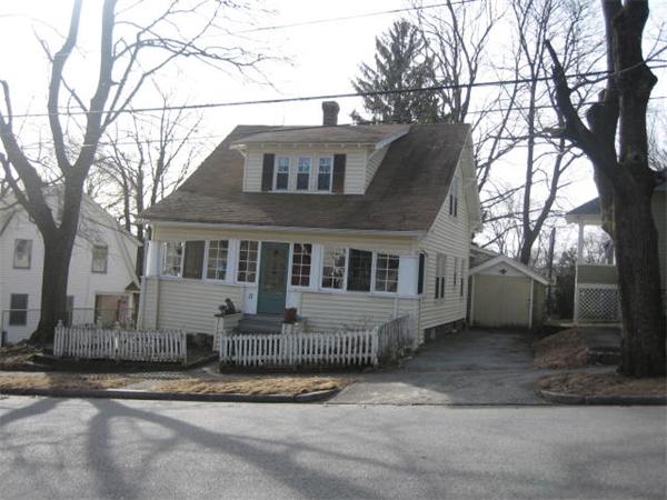 17 Tallawanda Drive Worcester, MA 01603 - Photo 20 of 20 a front view of a house with a yard and garage