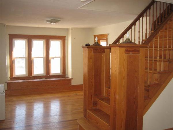 17 Tallawanda Drive Worcester, MA 01603 - Photo 3 of 20 a view of an entryway with wooden floor and door