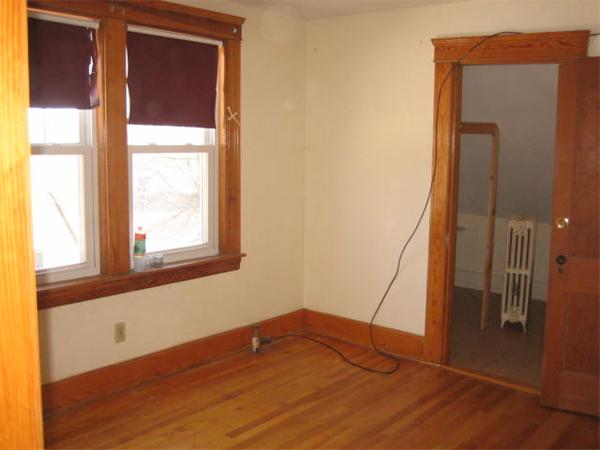 17 Tallawanda Drive Worcester, MA 01603 - Photo 7 of 20 a view of an empty room with wooden floor and a window