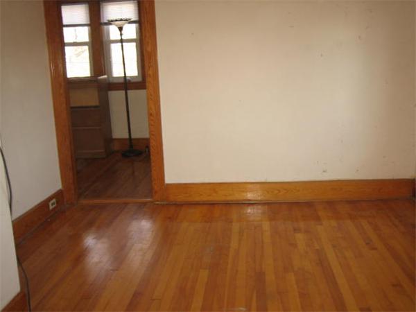 17 Tallawanda Drive Worcester, MA 01603 - Photo 8 of 20 an empty room with wooden floor and windows