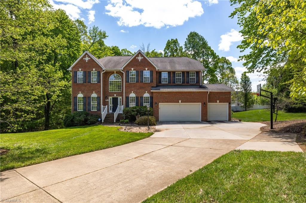 713 Number Ten Way Oak Ridge, NC 27310 - Photo 1 of 1 Front