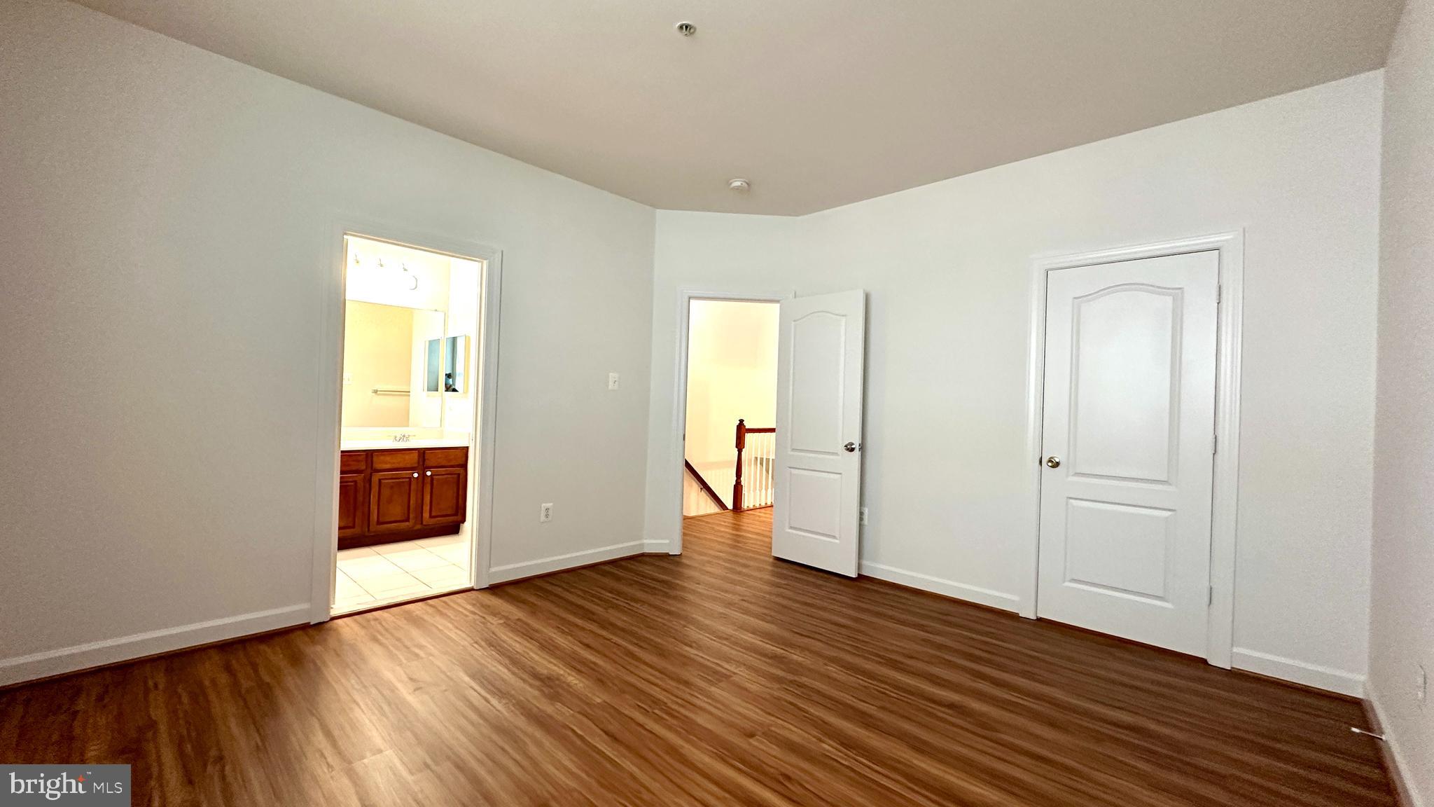 14020 Castle Ridge Way, Unit 38 Silver Spring, MD 20904 - Photo 13 of 30 a view of empty room with wooden floor