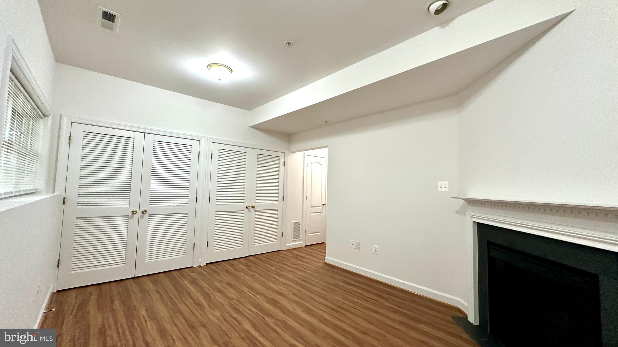14020 Castle Ridge Way, Unit 38 Silver Spring, MD 20904 - Photo 24 of 30 wooden floor in an empty room