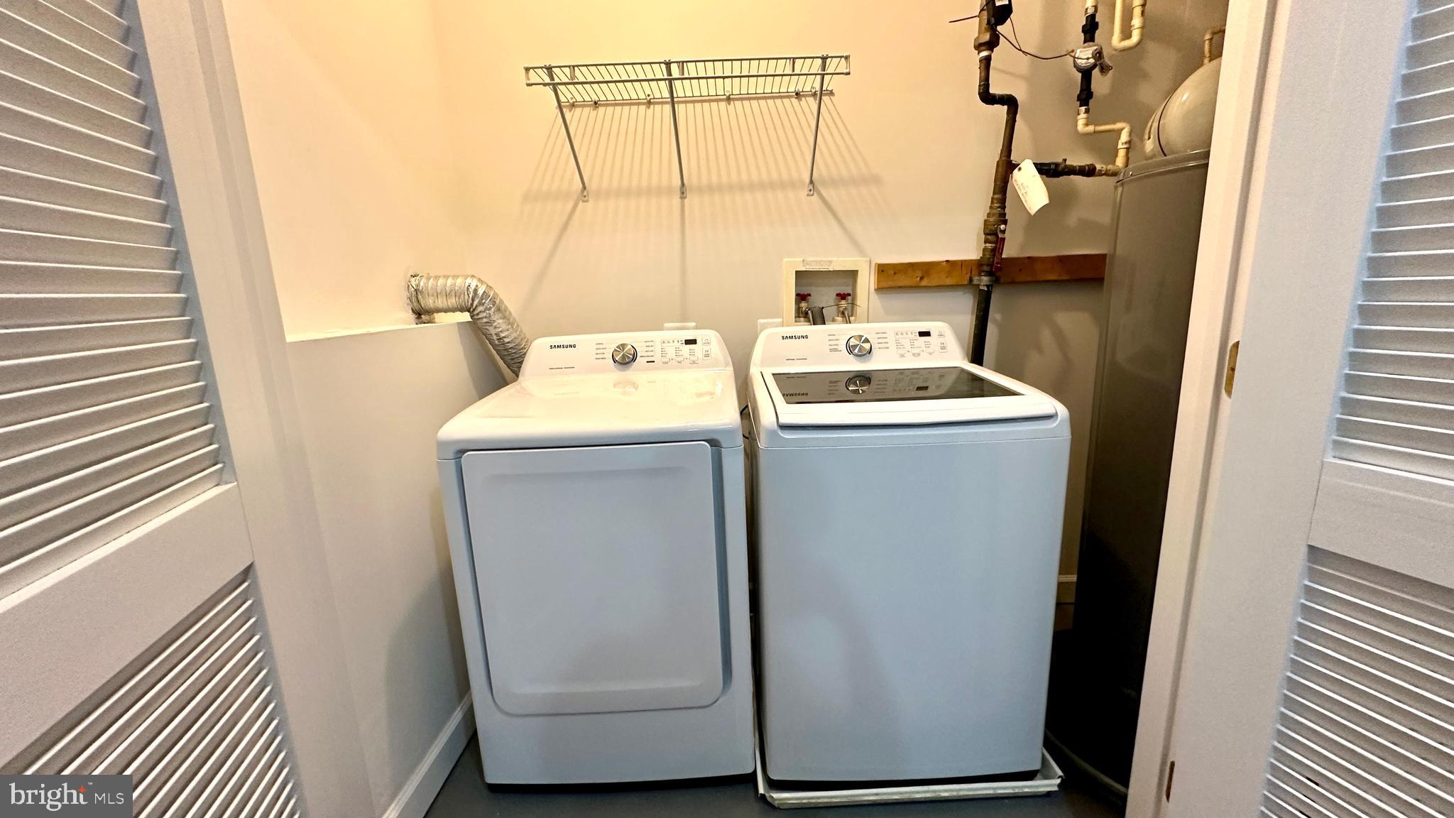 14020 Castle Ridge Way, Unit 38 Silver Spring, MD 20904 - Photo 30 of 30 a utility room with dryer and washer