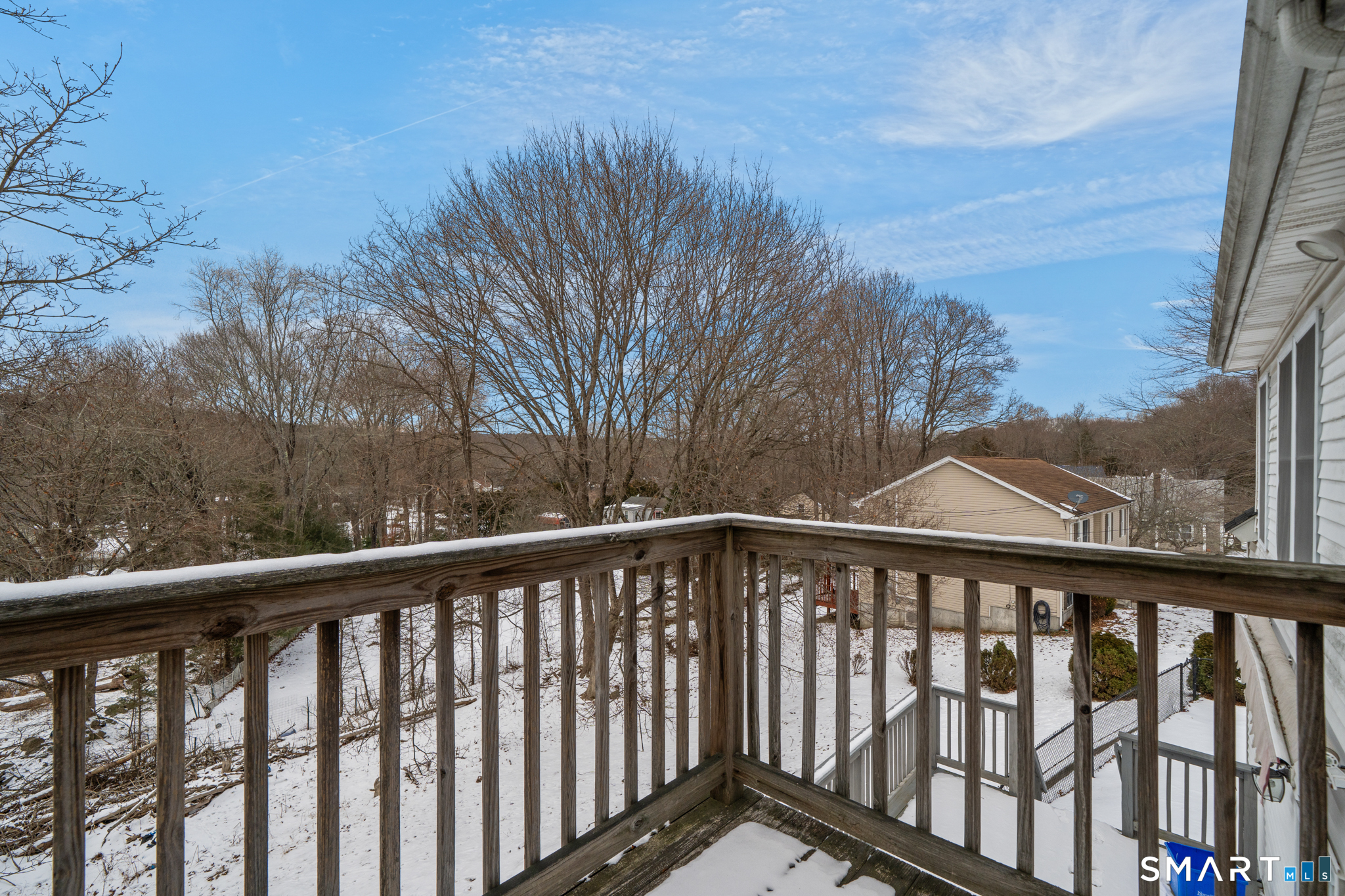 30 Ruth Street Norwich, CT 06360 - Photo 31 of 40 a view of a balcony with wooden fence and floor