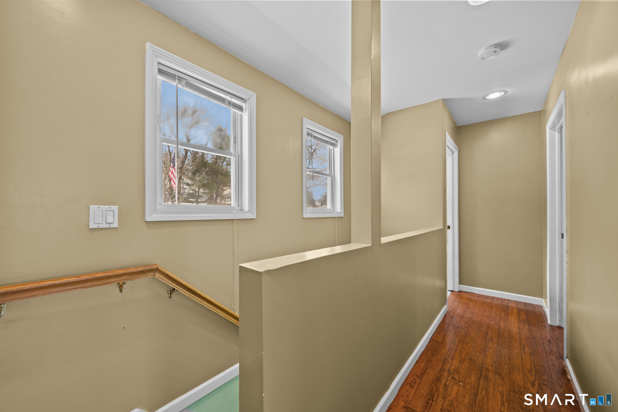 30 Ruth Street Norwich, CT 06360 - Photo 35 of 40 a view of hallway with window and wooden floor