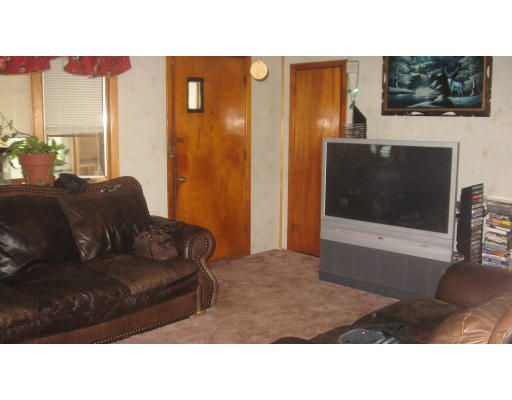 53 Vincent Street Springfield, MA 01129 - Photo 8 of 10 a living room with furniture and a flat screen tv