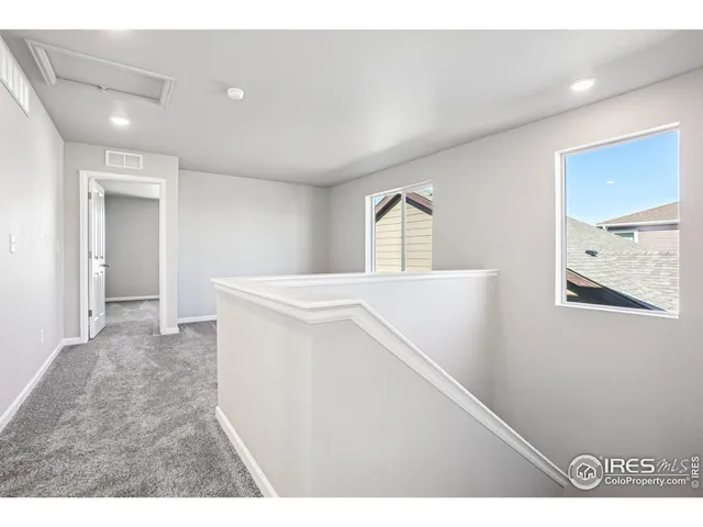 an empty room with a bench