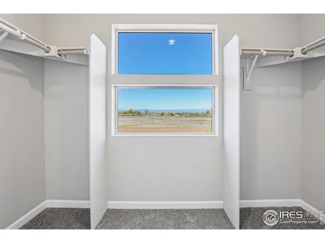 a bathroom with a sink vanity and mirror