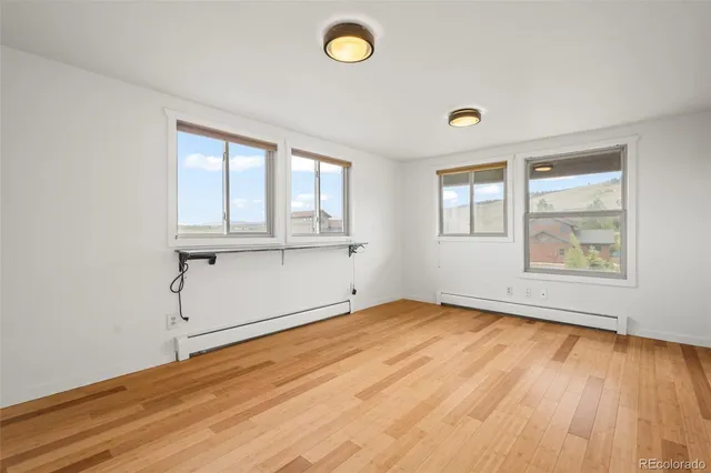 an empty room with windows