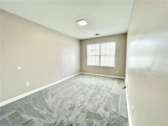 an empty room with window