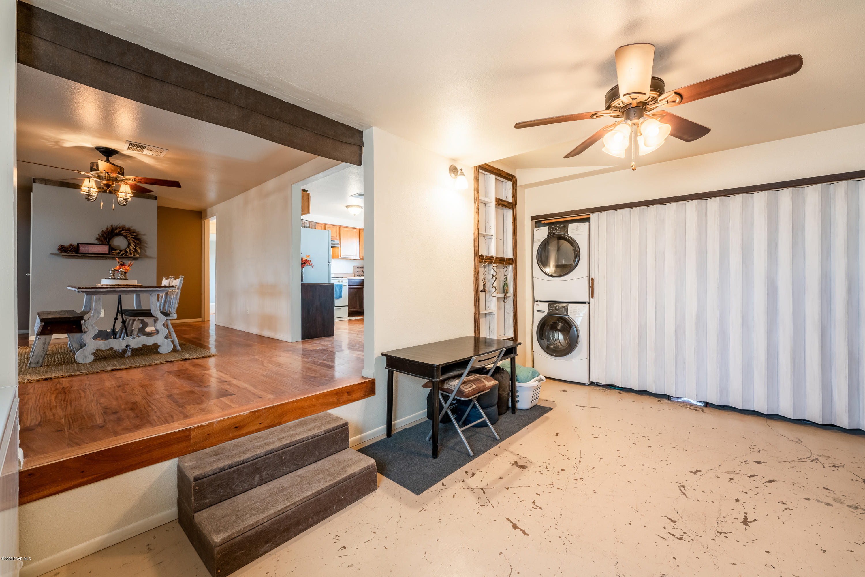 700 Ranch House Road Paulden, AZ 86334 - Photo 11 of 26 a view of a livingroom with furniture and gym equipment