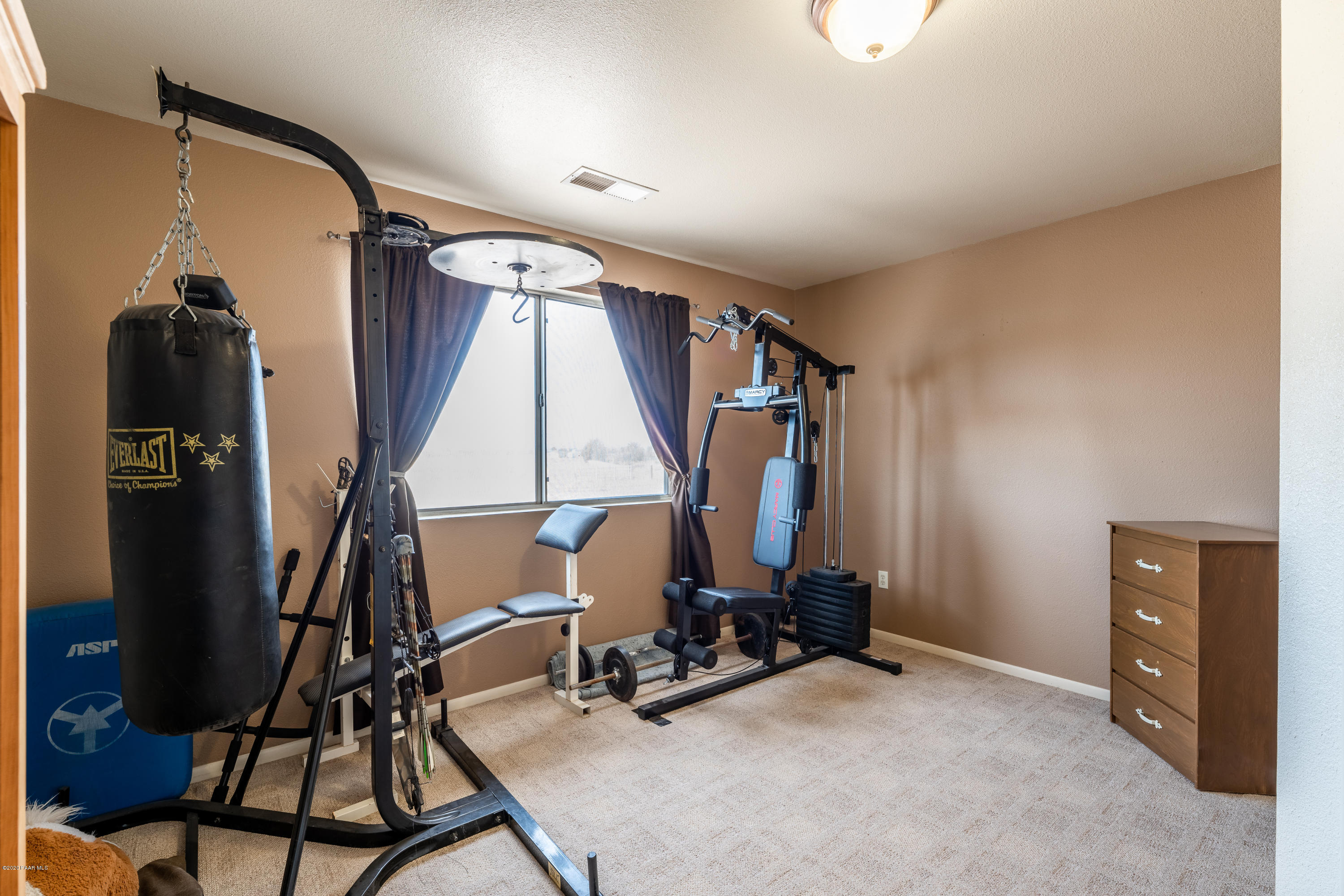 700 Ranch House Road Paulden, AZ 86334 - Photo 18 of 26 a view of a room with gym equipment