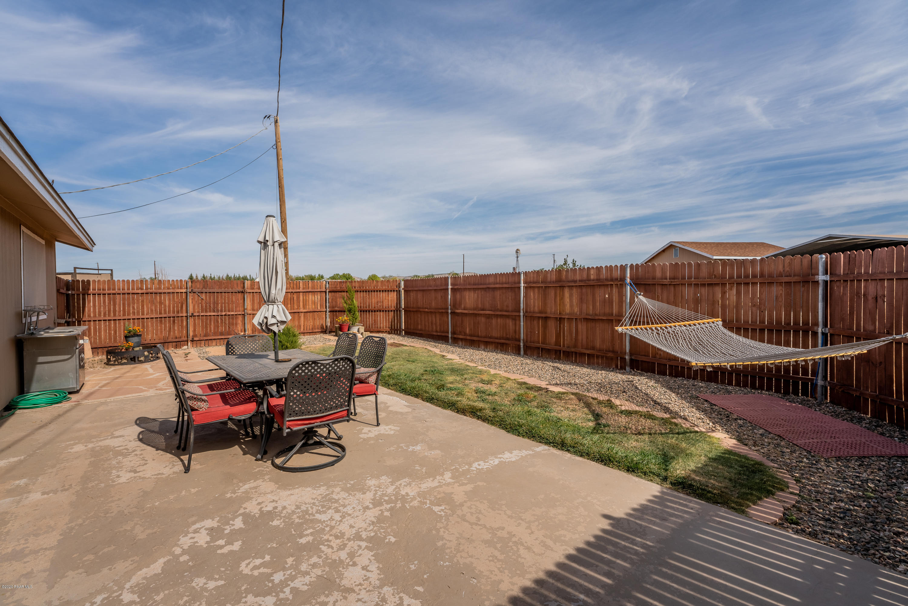 700 Ranch House Road Paulden, AZ 86334 - Photo 21 of 26 a view of a terrace with wooden floor and outdoor space