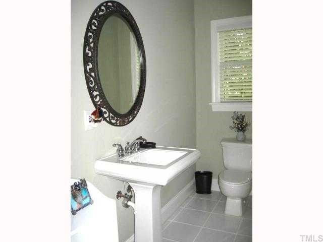 1502 Duplin Road Raleigh, NC 27607 - Photo 10 of 12 First floor full bath with ceramic tile floor Bathroom
