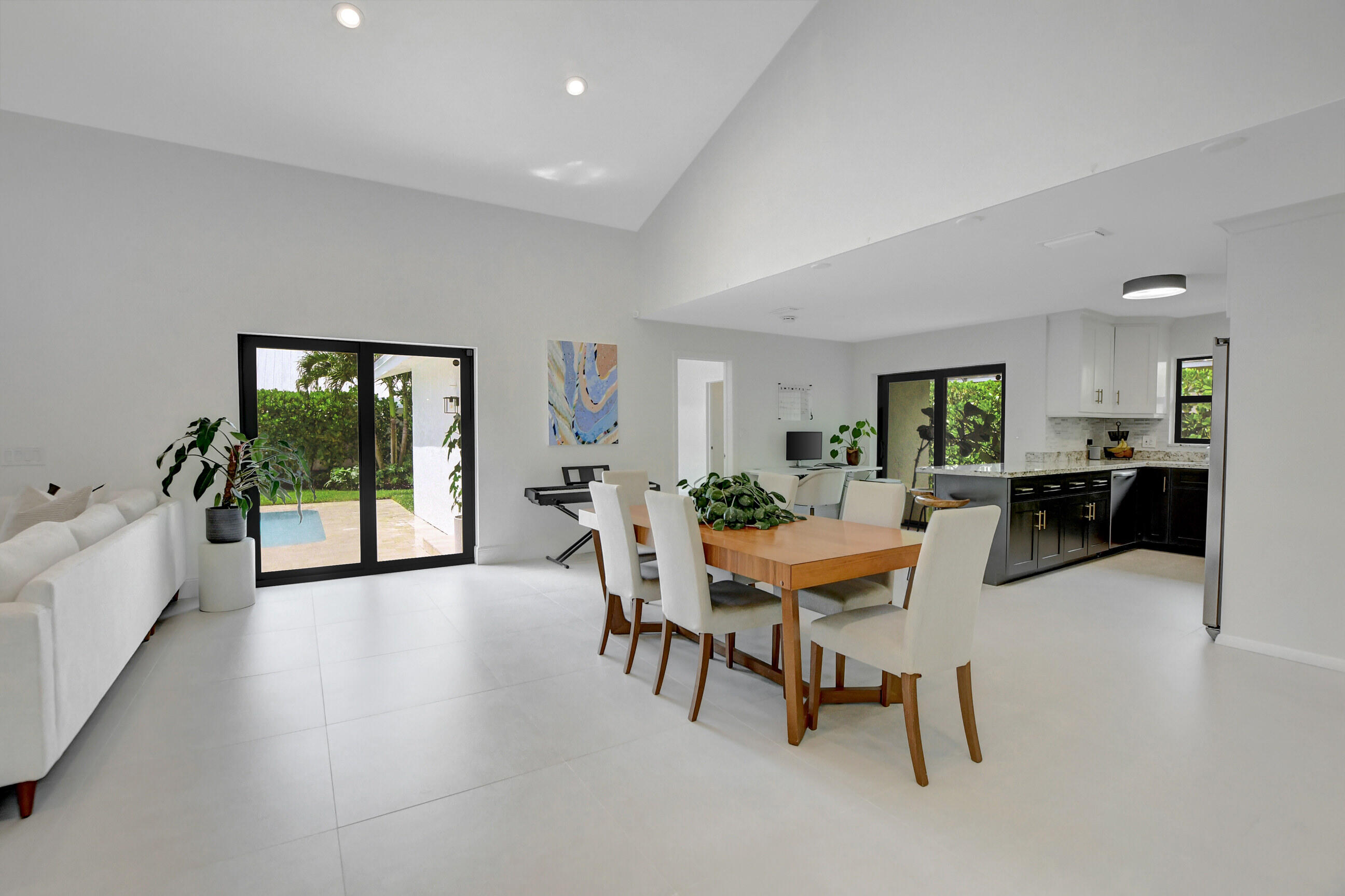 2632 Northwest 42nd Street Boca Raton, FL 33434 - Photo 5 of 17 Open Concept Living to Dining Areas