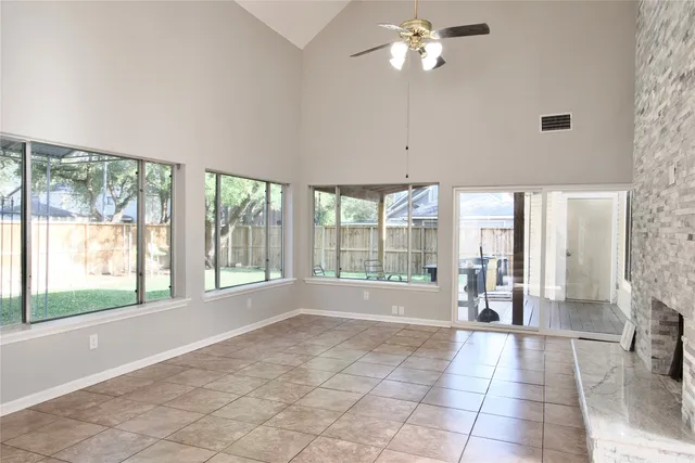 a kitchen with granite countertop a sink and a stove