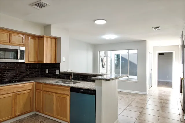 a bathroom with a sink and a bathtub