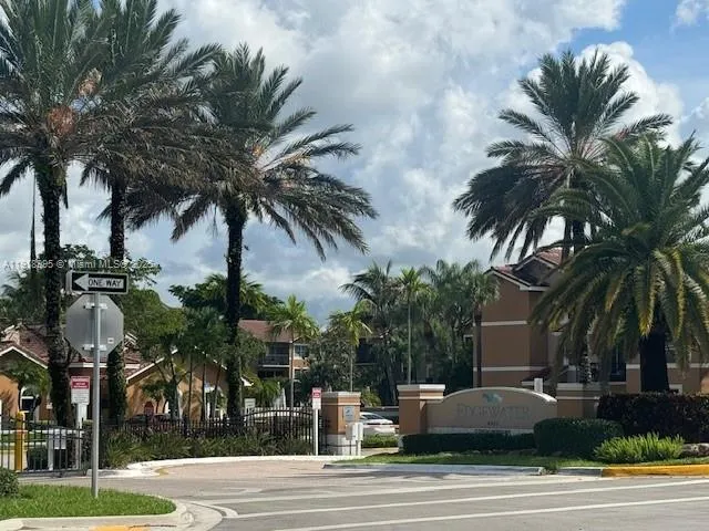 a view of a yard and car park