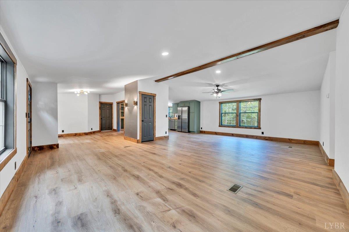 2781 Johnson School Road Thaxton, VA 24174 - Photo 23 of 63 a view of a livingroom with wooden floor and a window