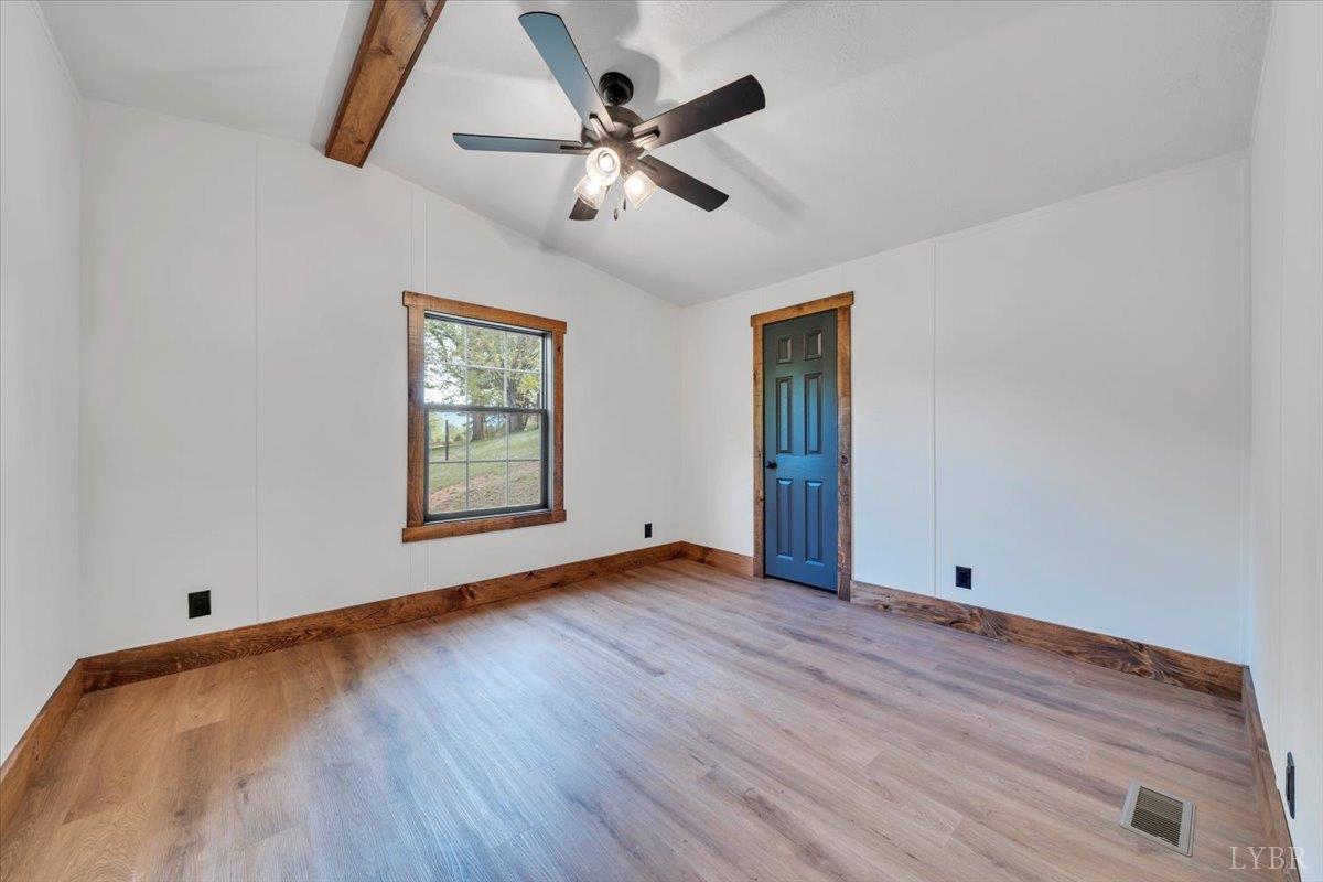 2781 Johnson School Road Thaxton, VA 24174 - Photo 31 of 63 wooden floor in an empty room with a window