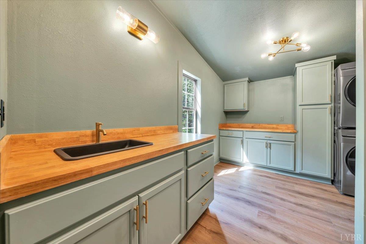 2781 Johnson School Road Thaxton, VA 24174 - Photo 40 of 63 a kitchen with stainless steel appliances a sink and a refrigerator