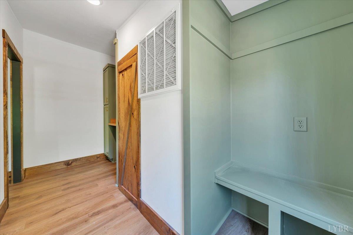 2781 Johnson School Road Thaxton, VA 24174 - Photo 46 of 63 a view of hallway with wooden floor