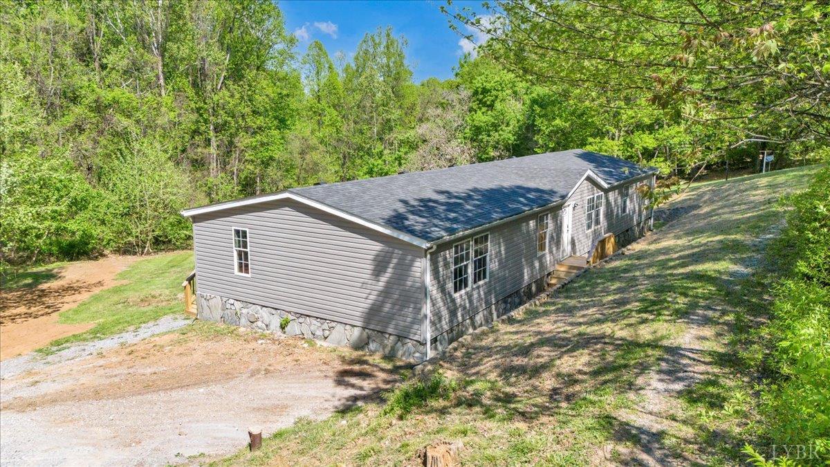 2781 Johnson School Road Thaxton, VA 24174 - Photo 55 of 63 a back yard of a house