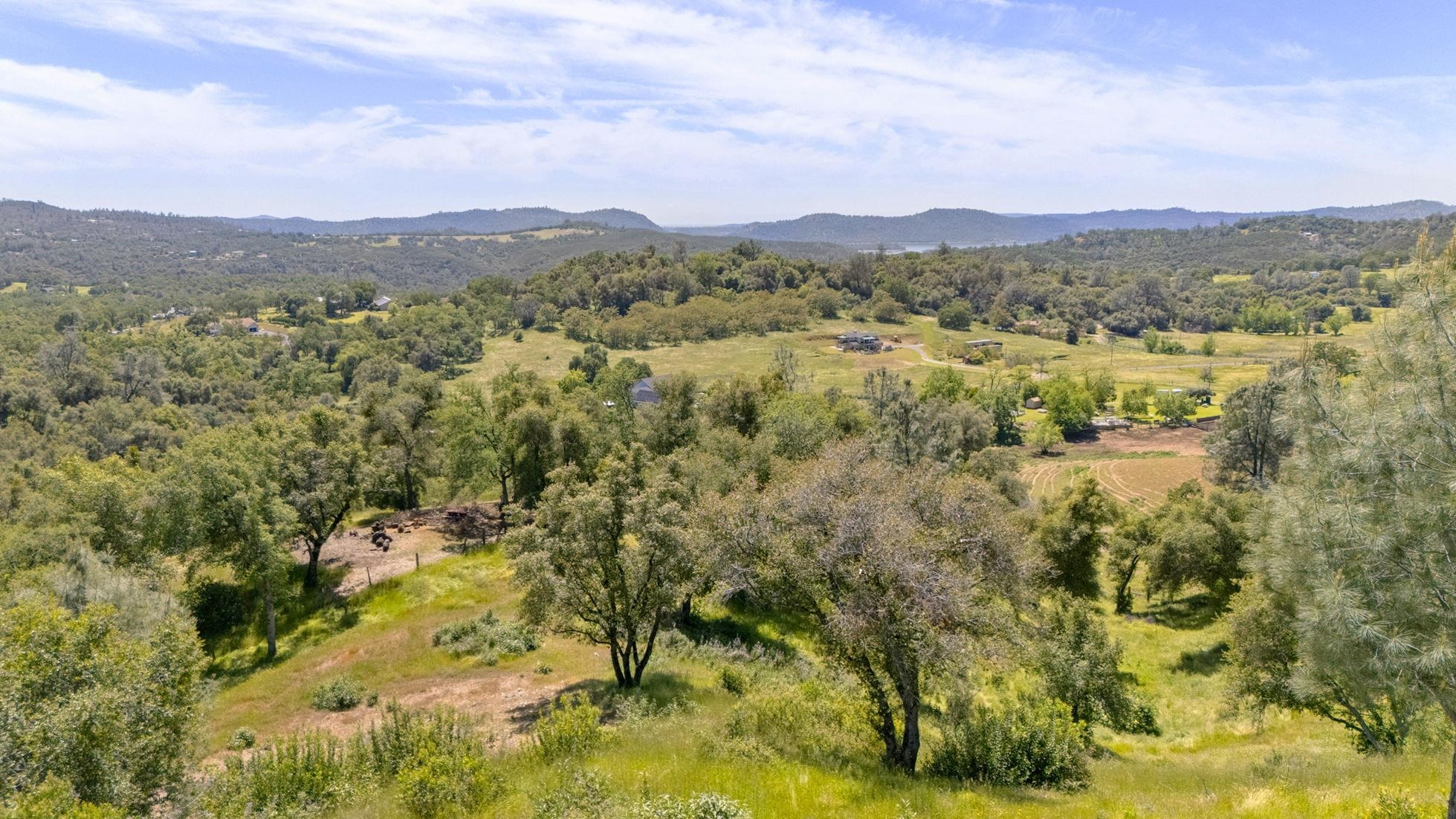 9082 Fraguero Road Sonora, CA 95370 - Photo 2 of 12 a view of a town with mountains in the background