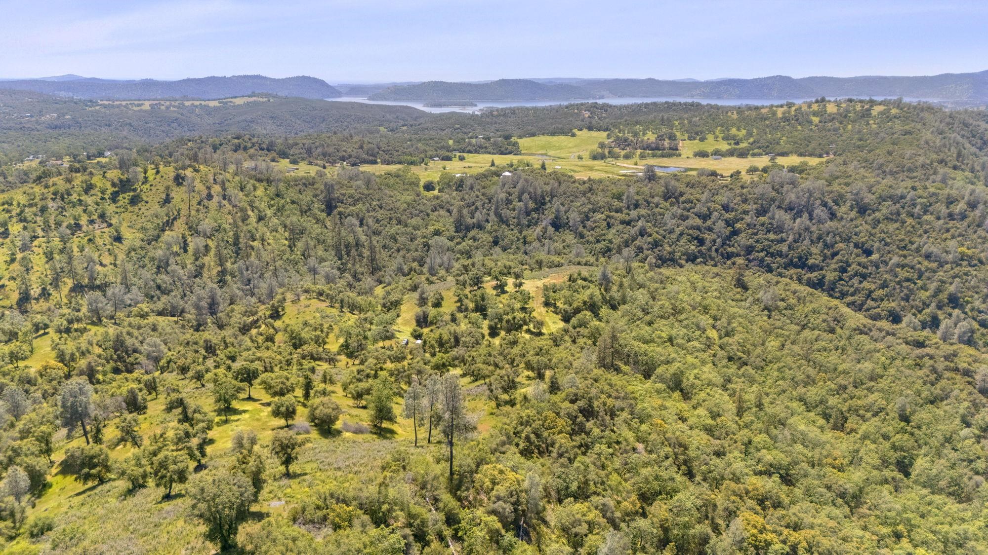 9082 Fraguero Road Sonora, CA 95370 - Photo 5 of 12 a view of mountain with lake in the background