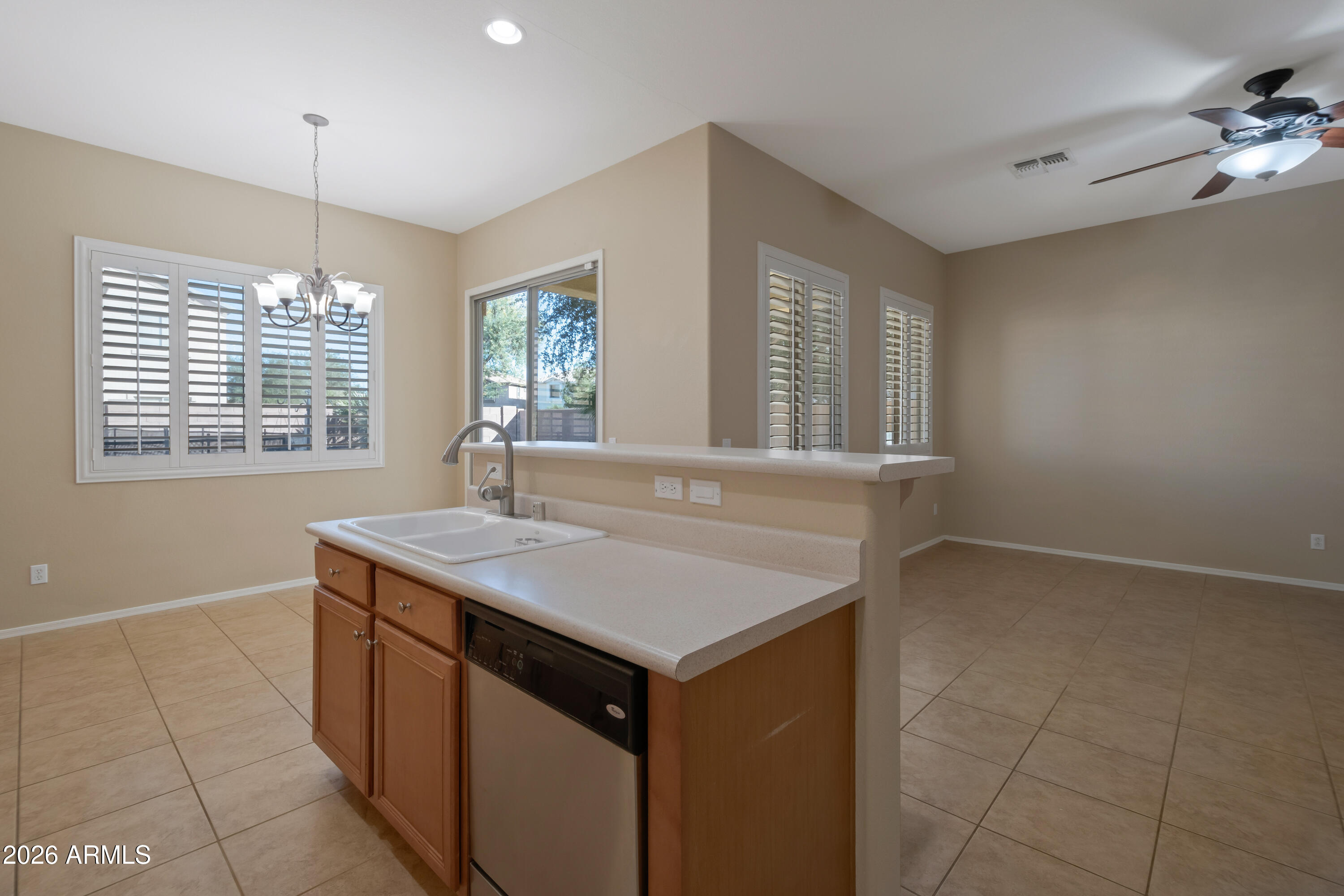 1912 East Flintlock Way Chandler, AZ 85286 - Photo 13 of 34 a room with a sink cabinets and a window