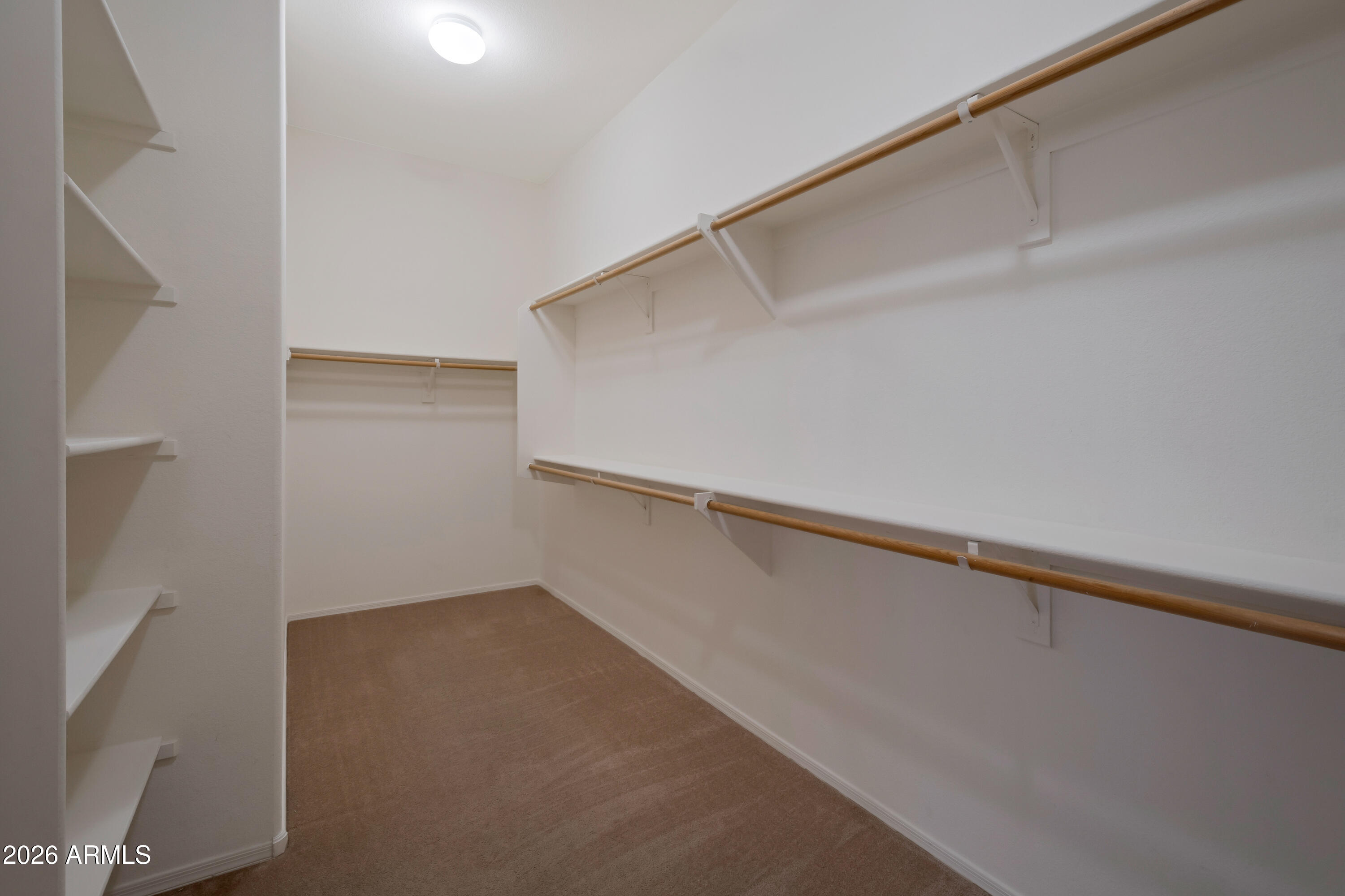 1912 East Flintlock Way Chandler, AZ 85286 - Photo 19 of 34 a view of an empty walk in closet