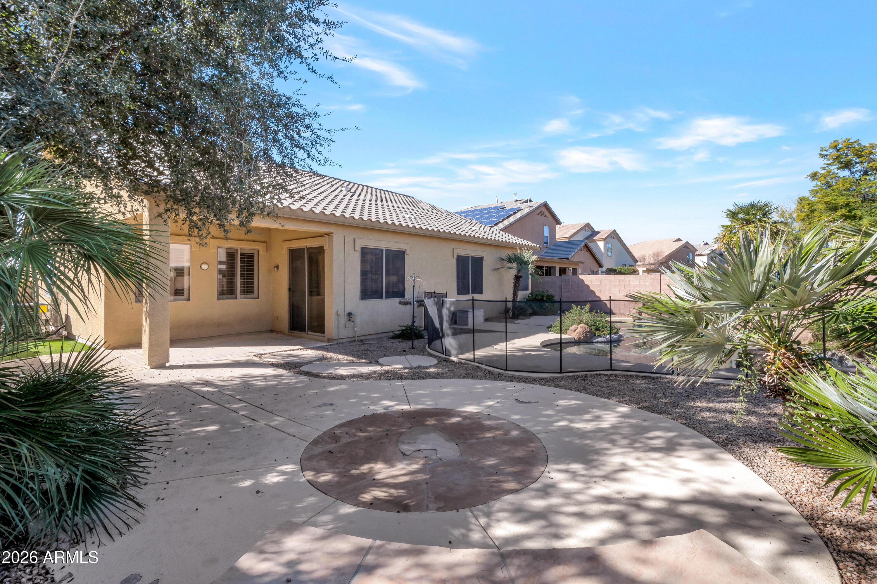 1912 East Flintlock Way Chandler, AZ 85286 - Photo 30 of 34 a view of a outdoor space with a patio and backyard