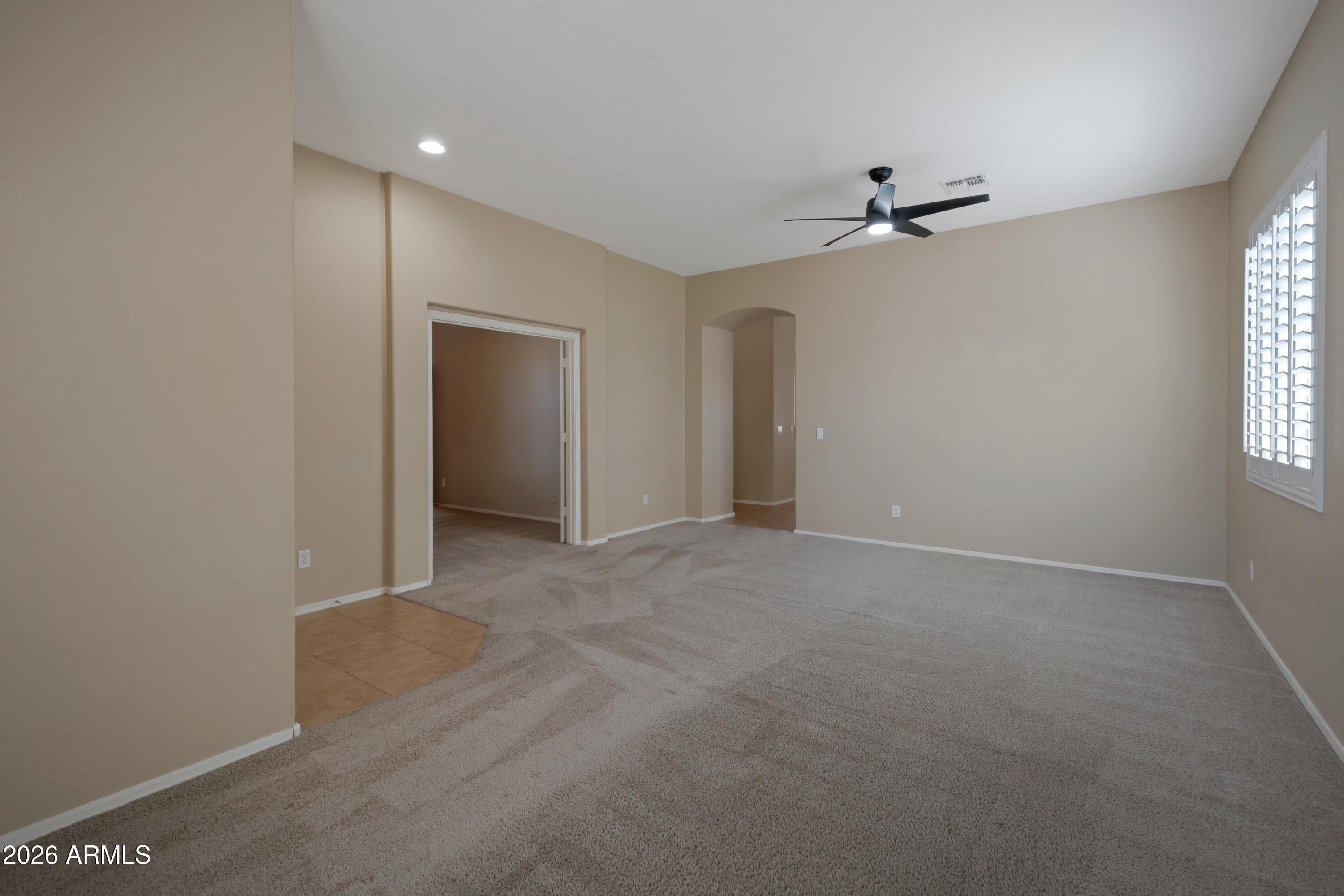 1912 East Flintlock Way Chandler, AZ 85286 - Photo 8 of 34 a view of an empty room with a window