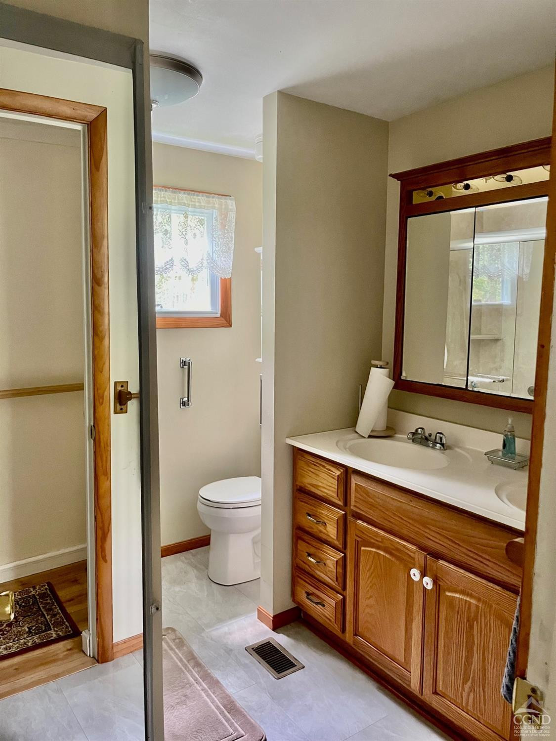 83 Ufferts Road Catskill, NY 12414 - Photo 16 of 29 a bathroom with a sink toilet and mirror