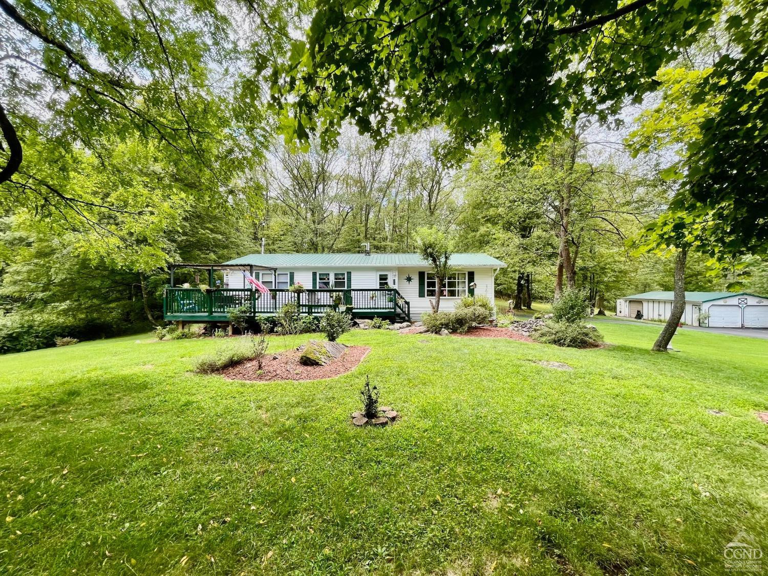 83 Ufferts Road Catskill, NY 12414 - Photo 2 of 29 a view of a house with a backyard and a patio