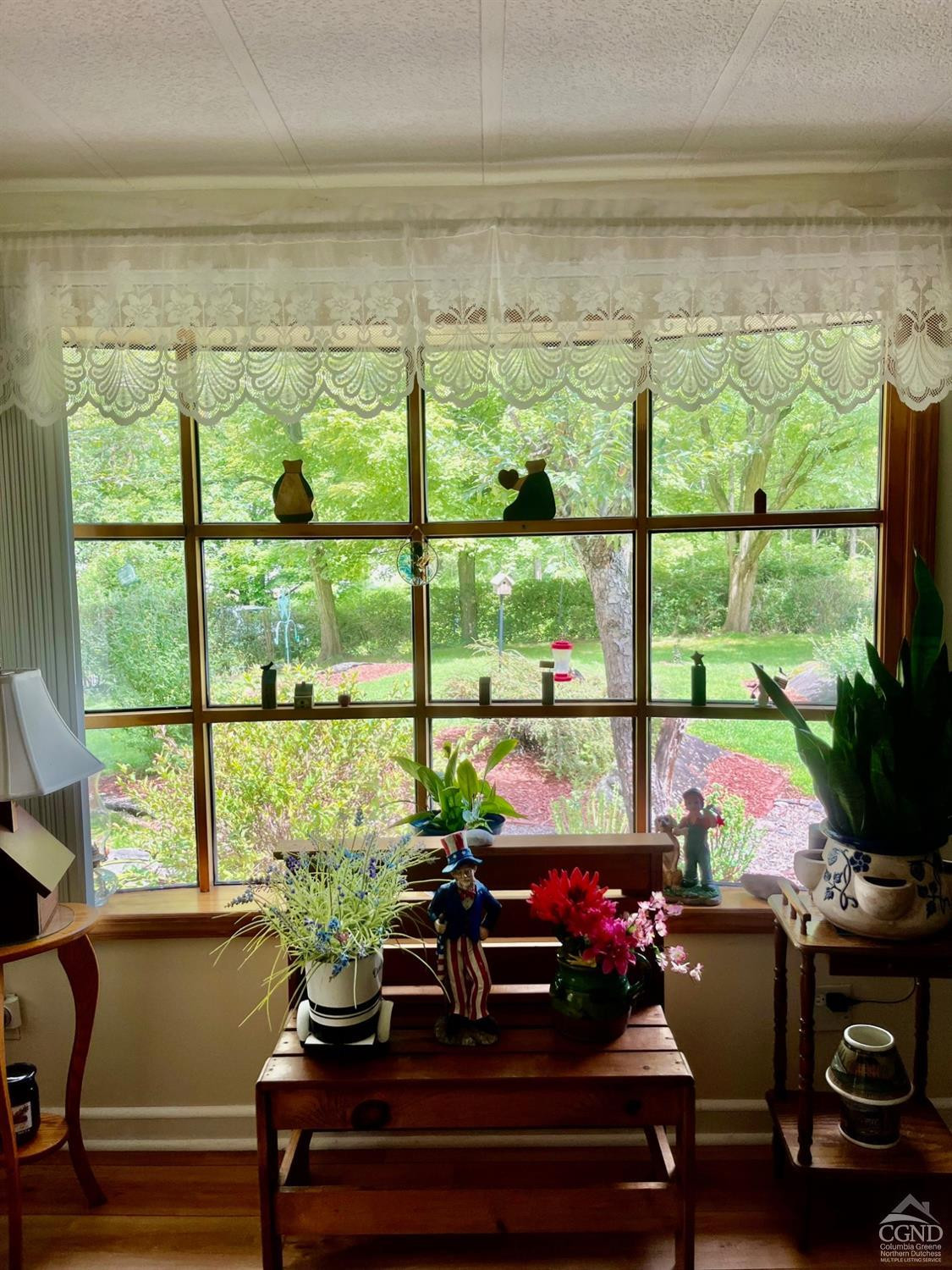 83 Ufferts Road Catskill, NY 12414 - Photo 7 of 29 a living room with furniture and a floor to ceiling window