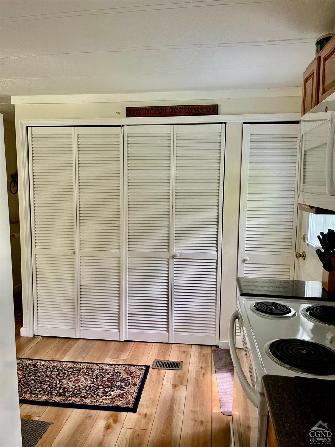 83 Ufferts Road Catskill, NY 12414 - Photo 10 of 29 a bathroom with a granite countertop sink and a mirror