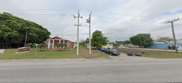 a view of a house with a street