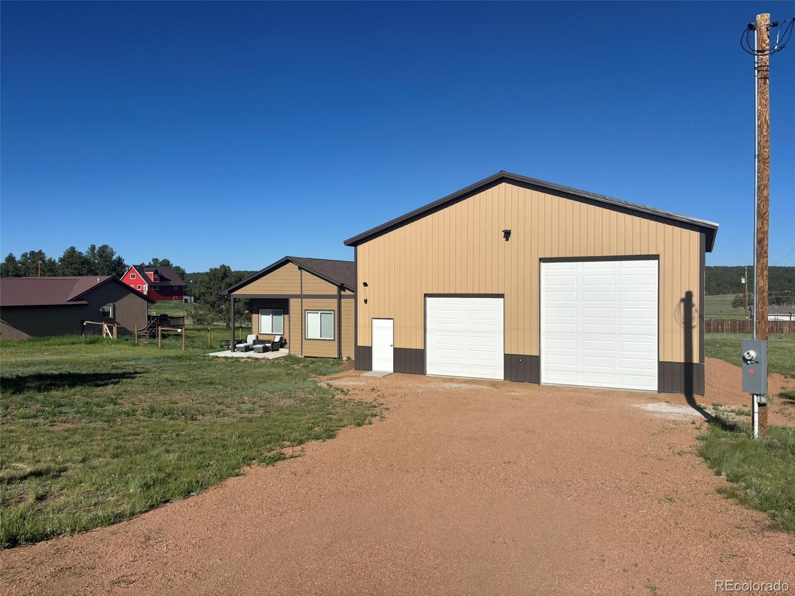 489 Duesouth Road Florissant, CO 80816 - Photo 40 of 45 a front view of a house with a yard