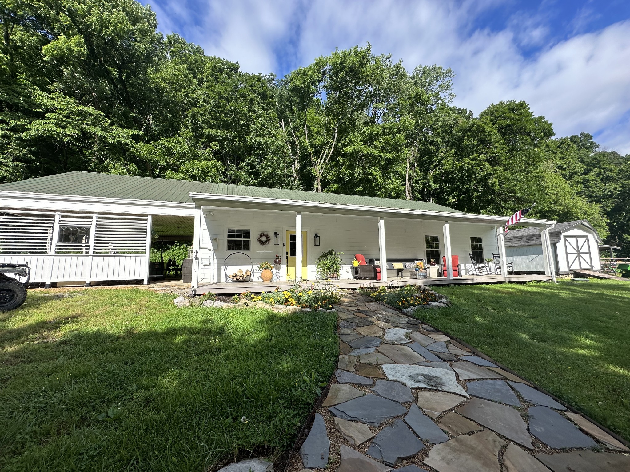 front view of a house with a garden
