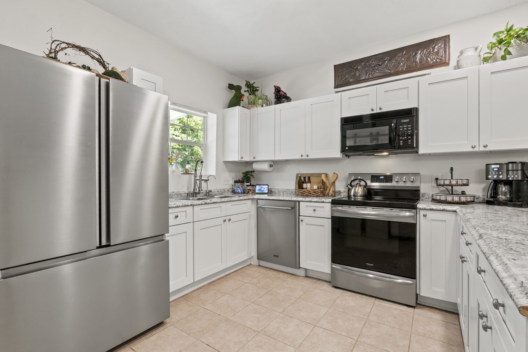 3336 Green Grove Road Hartsville, TN 37074 - Photo 12 of 64 a kitchen with stainless steel appliances granite countertop a refrigerator stove a sink and dishwasher