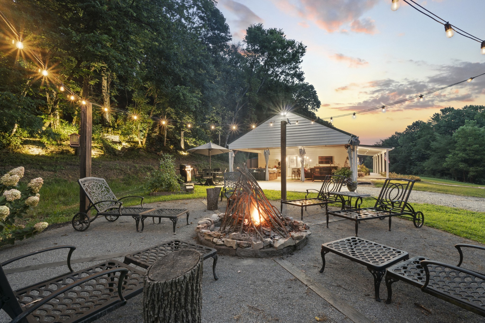 3336 Green Grove Road Hartsville, TN 37074 - Photo 23 of 64 a front view of a house with garden and sitting area