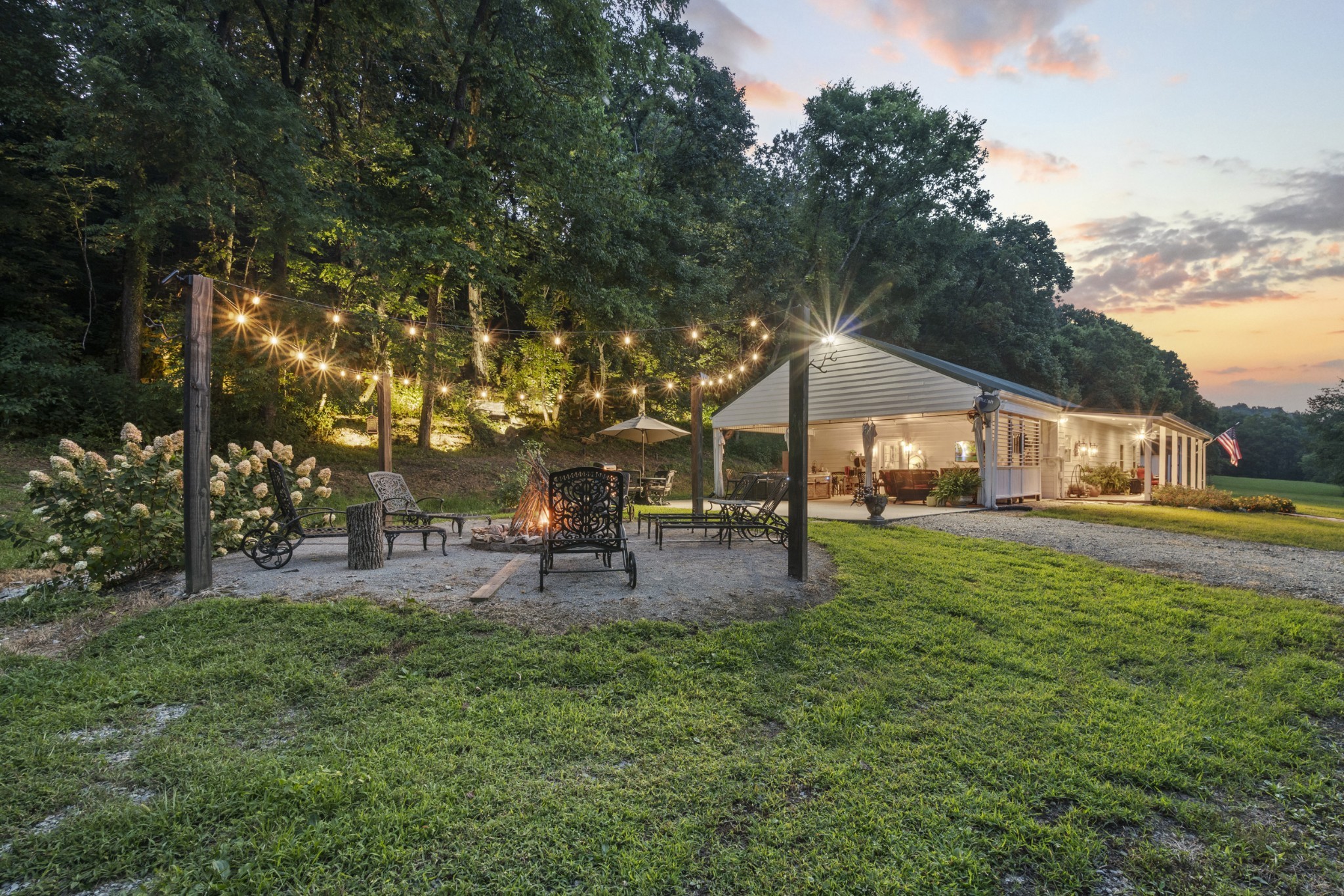 3336 Green Grove Road Hartsville, TN 37074 - Photo 42 of 64 a house view with a sitting space and garden