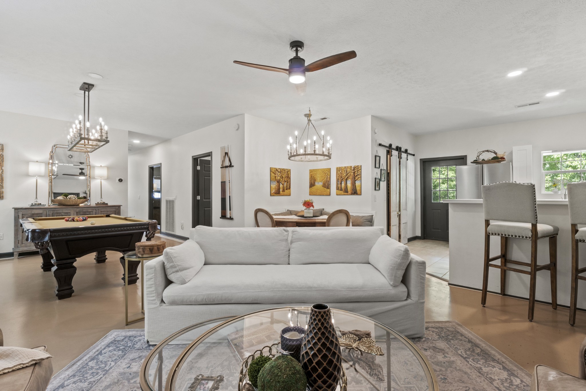 3336 Green Grove Road Hartsville, TN 37074 - Photo 6 of 64 a living room with furniture a fireplace and a chandelier