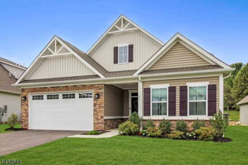 21 Harris Hawk Road Washington, NJ 07882 - Photo 1 of 26 front view of a house with a yard