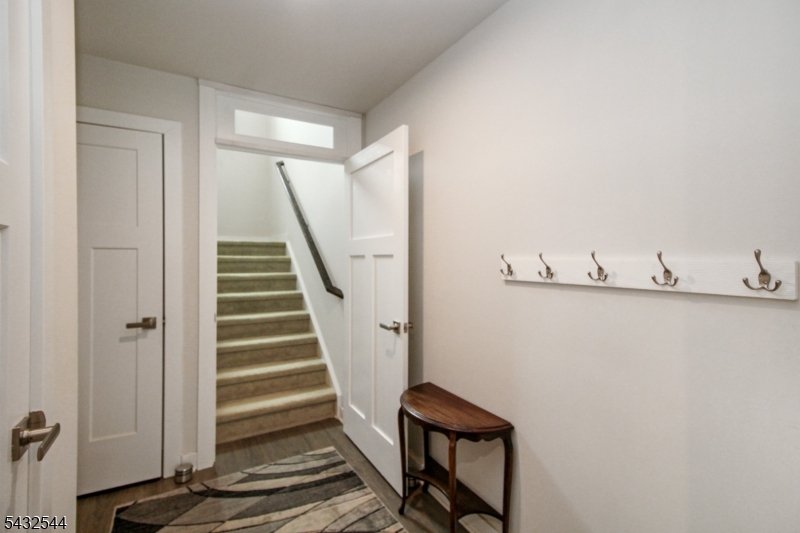 21 Harris Hawk Road Washington, NJ 07882 - Photo 17 of 26 a view of a hallway with staircase