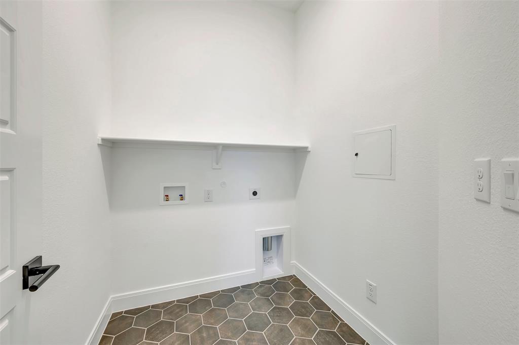 1856 Lightner Road Van Alstyne, TX 75495 - Photo 19 of 33 Dedicated laundry area with hexagon tile flooring