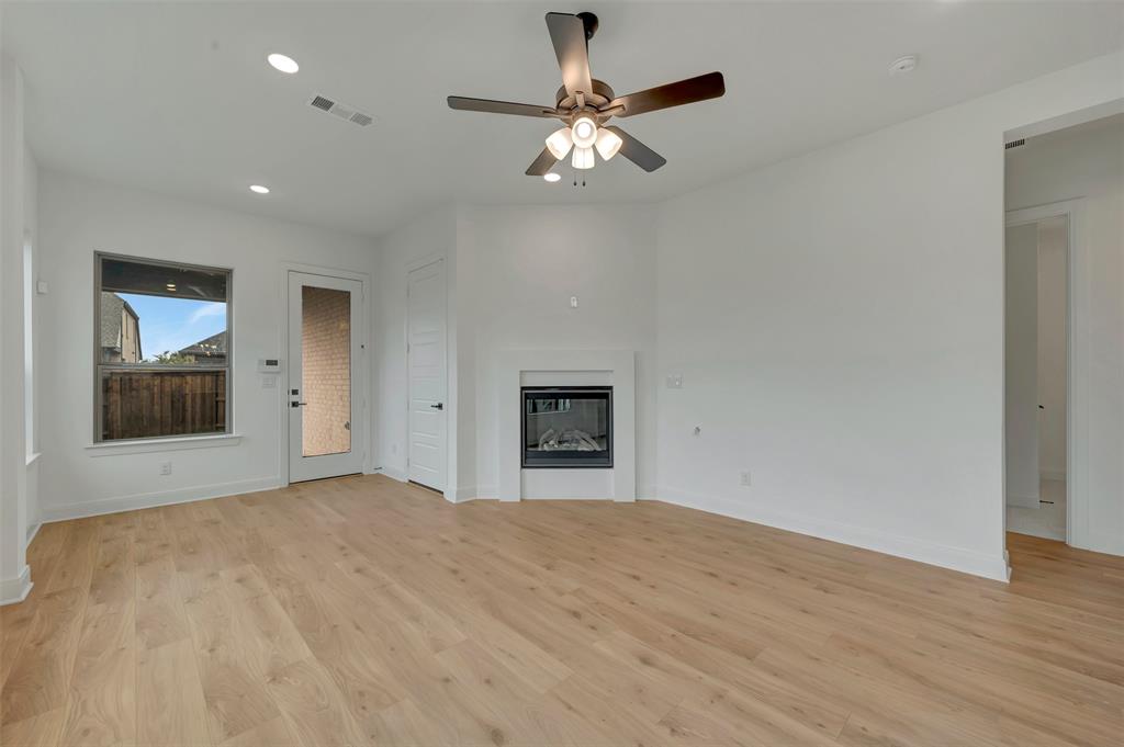 1856 Lightner Road Van Alstyne, TX 75495 - Photo 25 of 33 Spacious interior with light wood-finish flooring, recessed lighting, and a ceiling fan