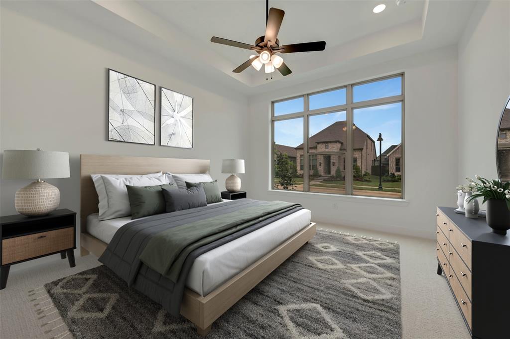 1856 Lightner Road Van Alstyne, TX 75495 - Photo 7 of 33 Spacious room featuring a tray ceiling, recessed lighting, and a multi-pane window